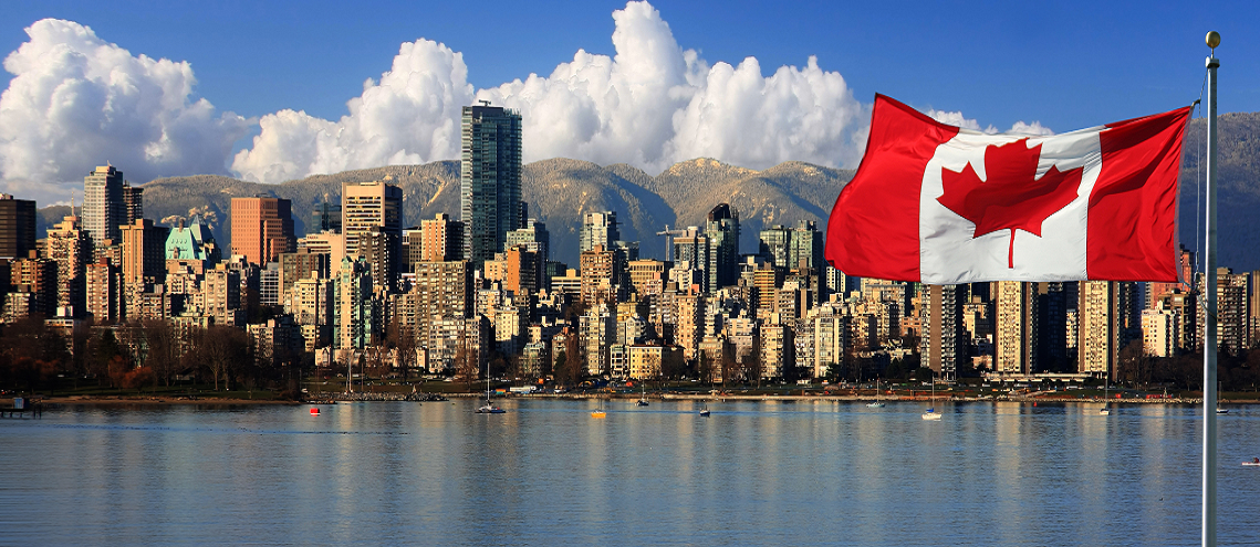 The Vancouver skyline with the Canadian flag